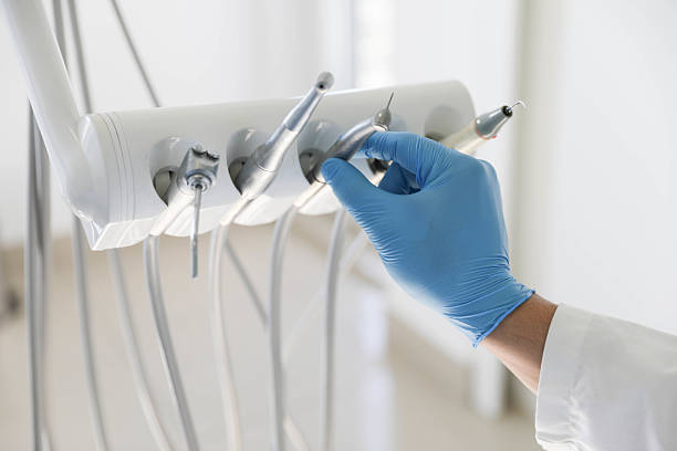 Professional Tooth Extraction technician working in Grove City, OH